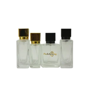 flacons parfum Kenzi transparents avec bouchons carrés noirs et dorés, design marocain moderne, Pack’Arijing