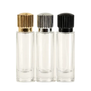 Flacon parfum strié luxe en verre transparent avec bouchons doré argenté et noir
